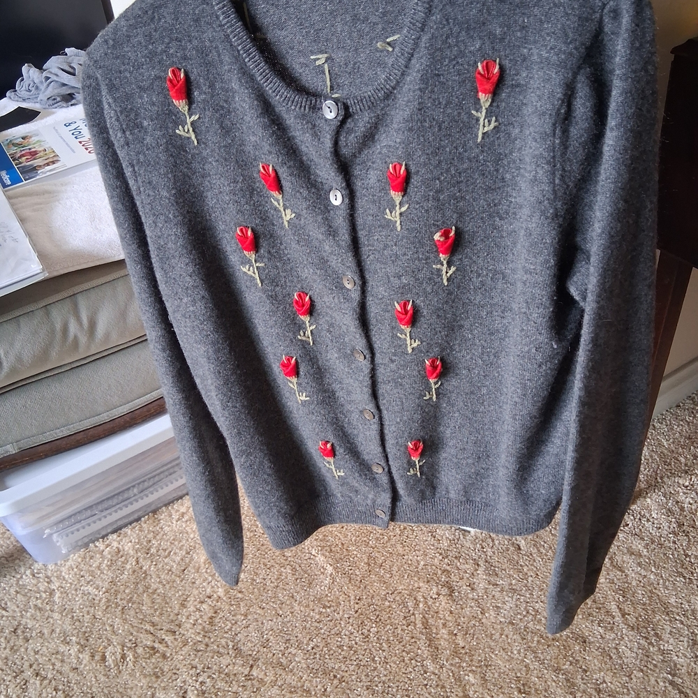 Dark grey cashmere cardigan sweater with red roses.